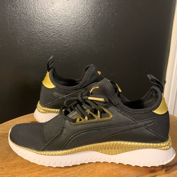 DONATED: Puma Black & Gold Sneakers - Picture 1 of 7